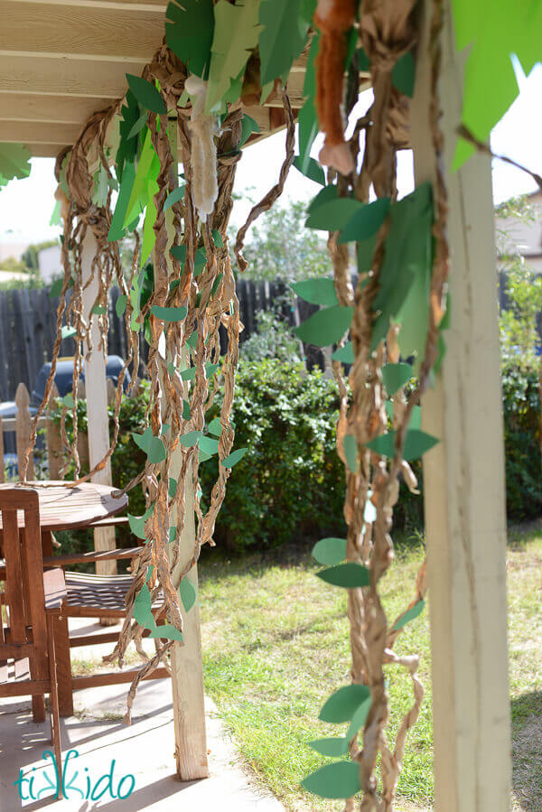 Paper vines decorating a back porch at the jungle birthday party