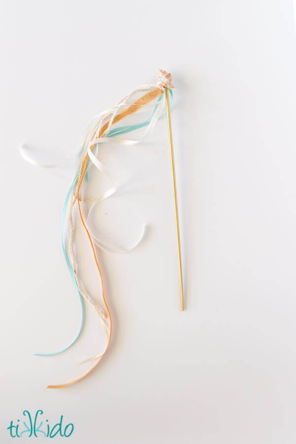 Nautical themed wedding ribbon wand on a white background.