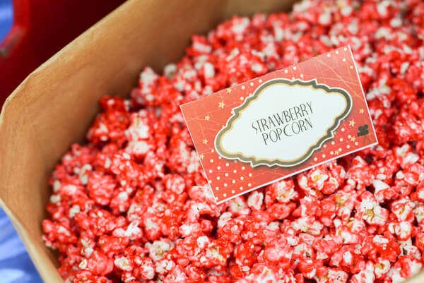 Strawberry candied popcorn made with Kookaid (Kool Aid Popcorn)