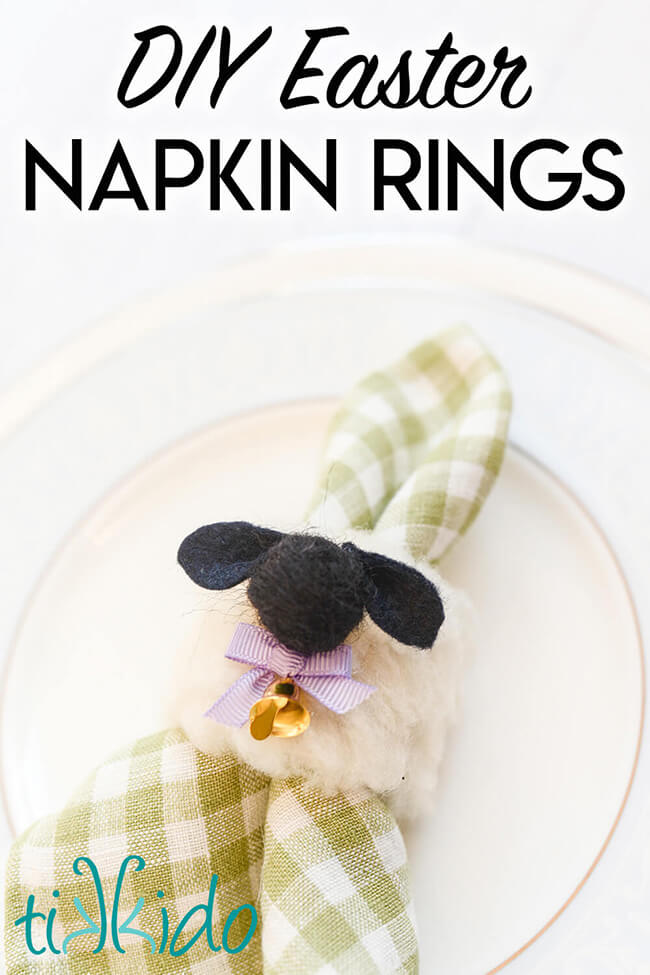 DIY Easter napkin ring that looks like a sheep on a green gingham napkin, on a white plate.