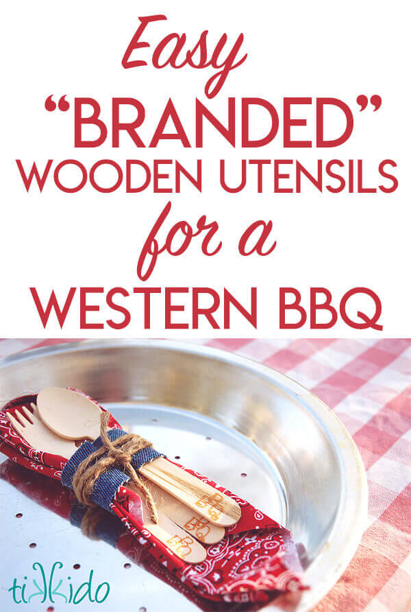Pie tin plate, bandana napkin, and wooden silverware branded with BBQ tied with a denim and string napkin ring.