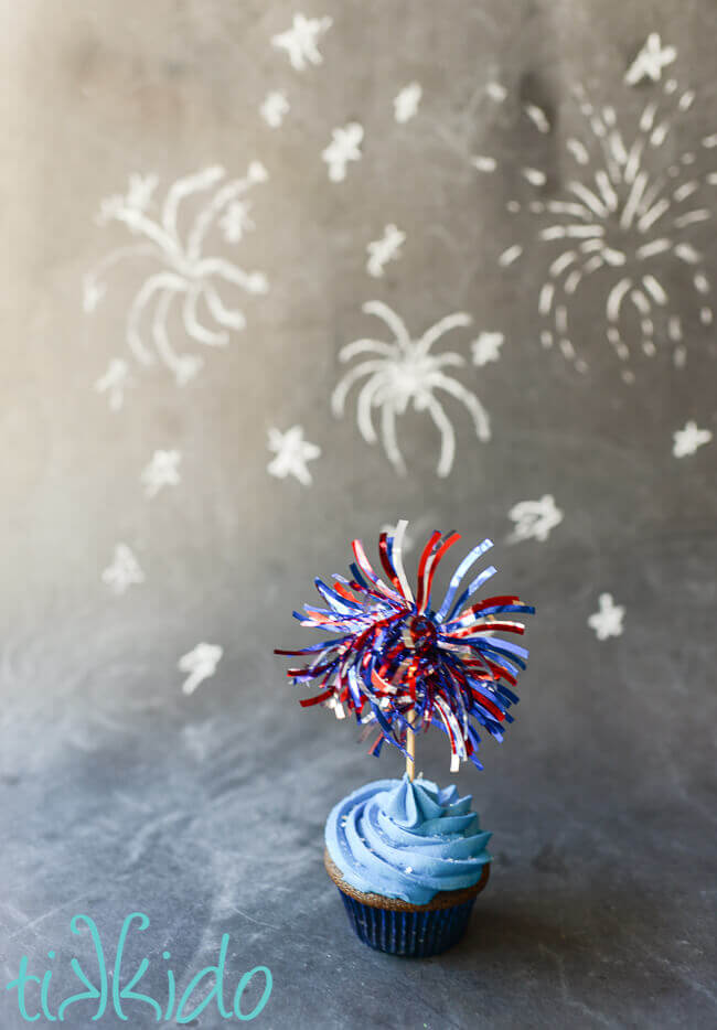 4th of July fireworks cupcake topper made out of shiny patriotic garland