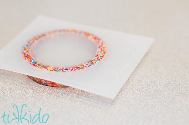 How to make a sprinkles resin bracelet using epoxy resin, sprinkles, and a bracelet mold.