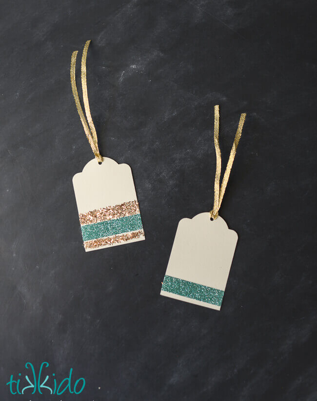 DIY Gift Tags made with stripes of gold and aqua glitter.
