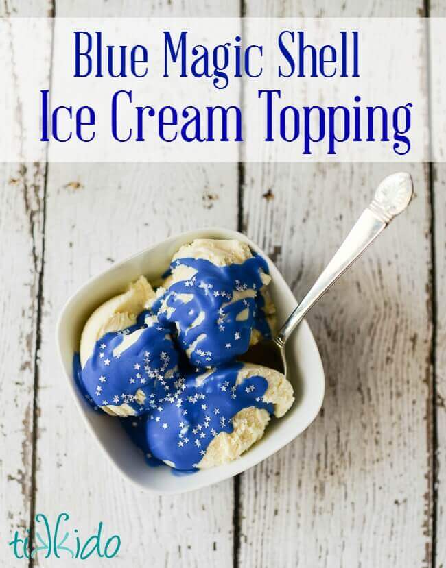 Vanilla ice cream topped with blue magic shell ice cream topping and sprinkled with silver star sprinkles.  Text overlay reads "Blue Magic Shell Ice Cream Topping."