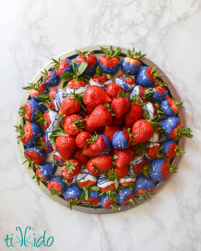 Patriotic red, white, and blue chocolate covered strawberry platter for Memorial Day and the 4th of July.