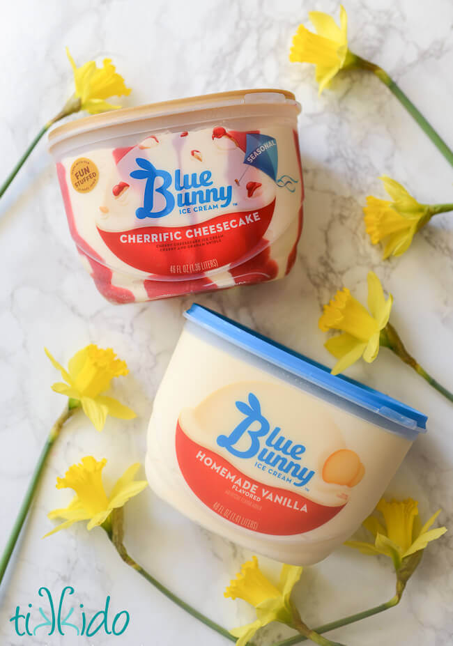 Blue Bunny Ice Cream and daffodils on a white marble background.