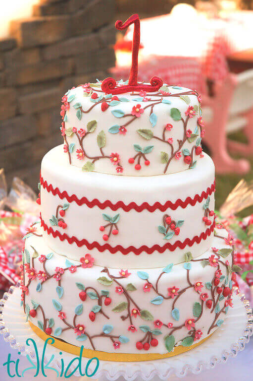 Calico fabric inspired birthday cake at the Strawberry Picnic birthday party.