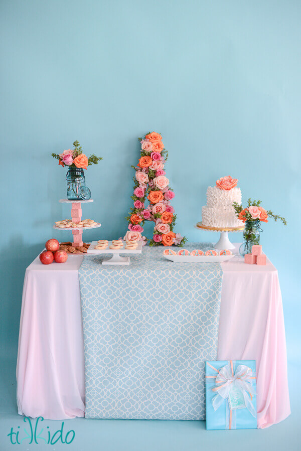 Elegant baby shower brunch setup themed around the letter A.