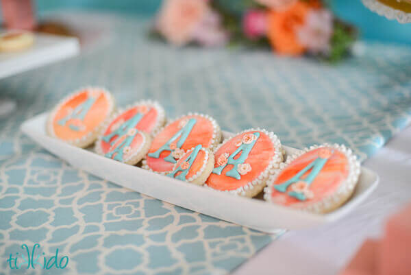 Watercolor painted monogram sugar cookies