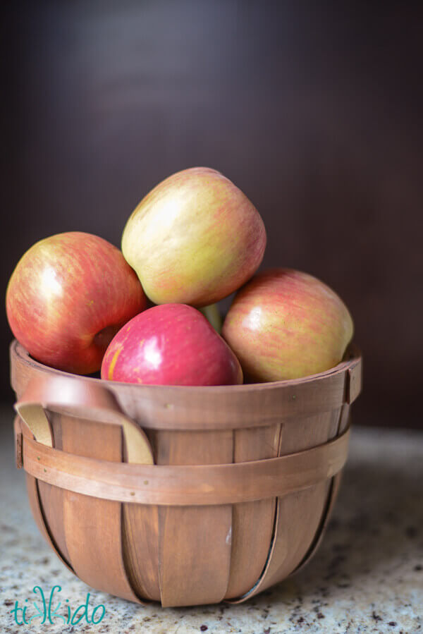 wooden basket of apples