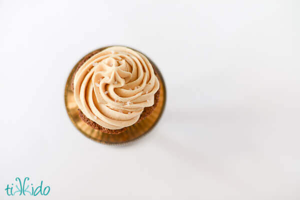 Apple spice cupcake topped with salted caramel icing