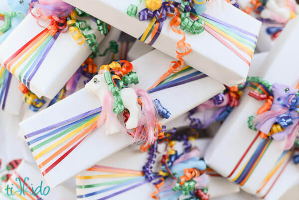 Inexpensive rainbow ribbon wrapped favors at the My Little Pony birthday