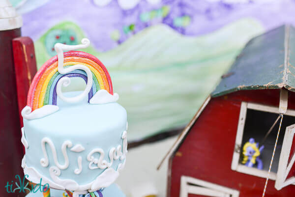 Rainbow cake topper on a blue My Little Pony cake.