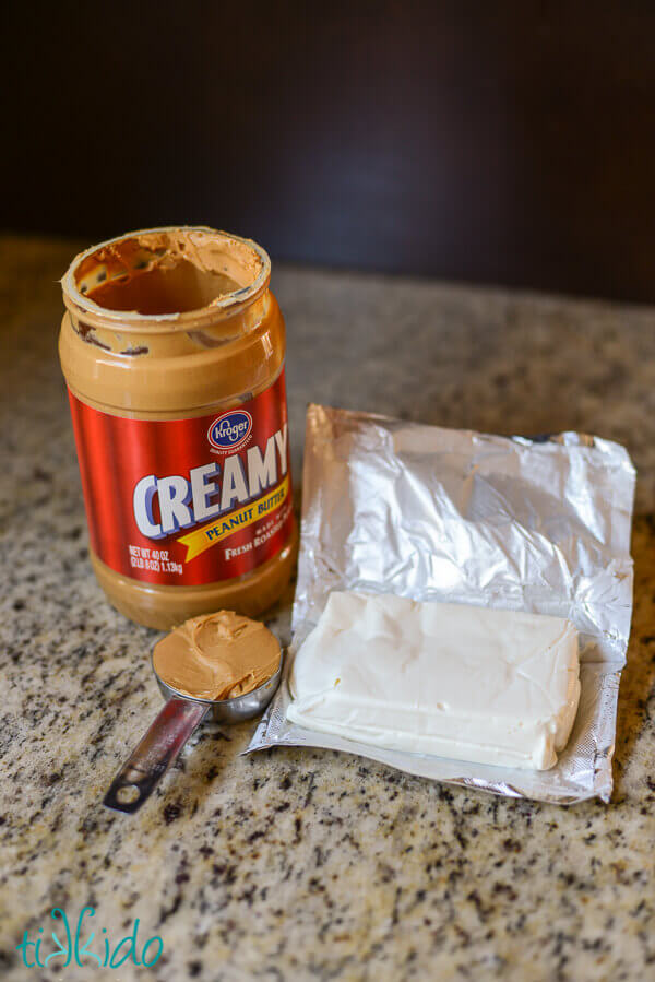 Peanut butter and cream cheese on a granite surface