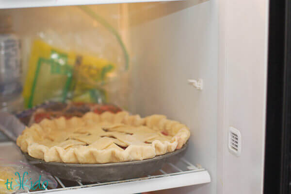 Unbaked apple pie being frozen in the freezer ahead of the holidays.