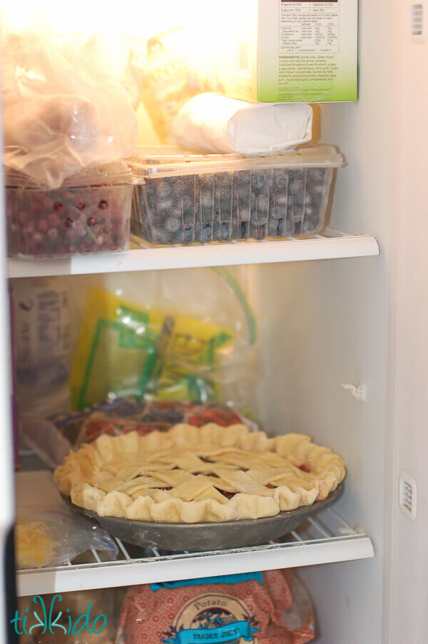 Unbaked apple pie being frozen in the freezer ahead of the holidays.