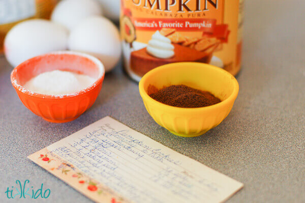 Ingredients and recipe card for soft pumpkin cookie recipe.