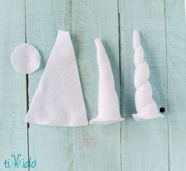Photo that shows the progression of creating the no sew felt unicorn horns.