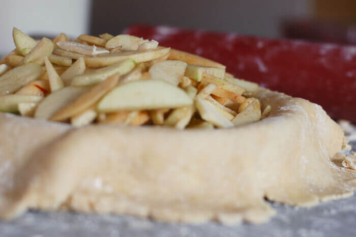 From Scratch apple pie filling in a pie crust.