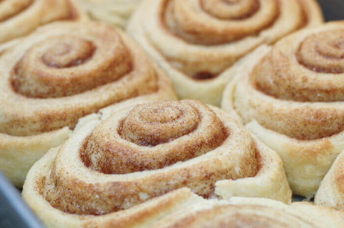 Closeup of baked Homemade cinnamon rolls in a pan
