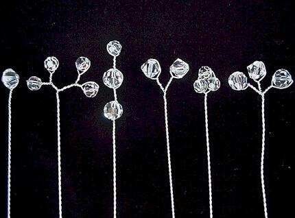 Swarovski crystal stems for wedding bouquets on a black background.