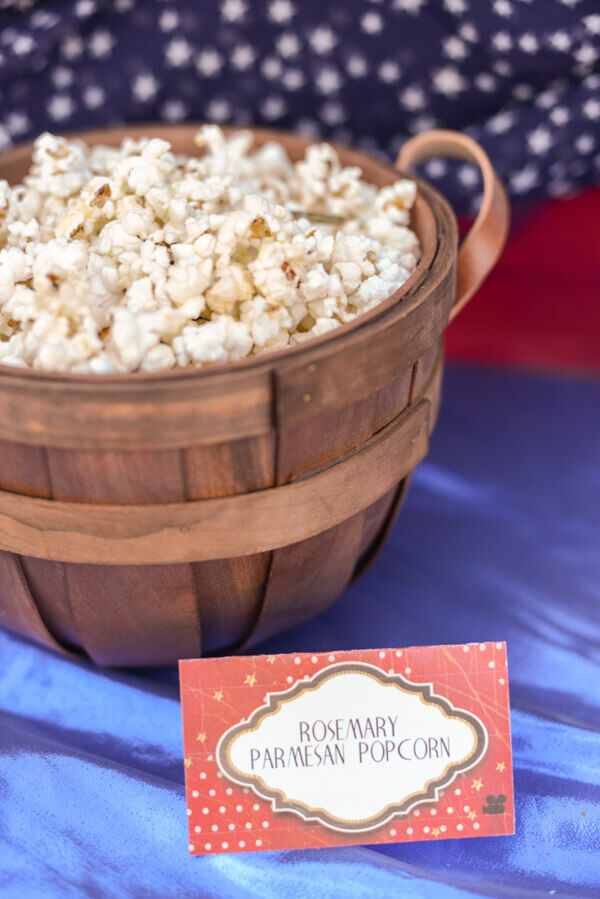 Rosemary Parmesan popcorn in a wooden bowl.