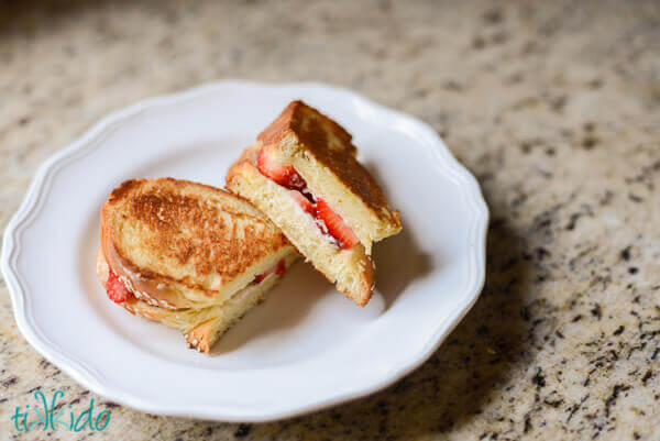 Mascarpone, honey, and strawberry grilled cheese on challah bread.