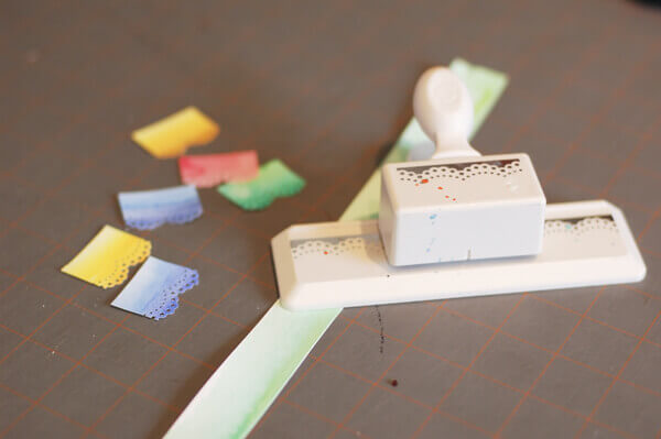 Materials for making miniature Mexican papel picado bunting.