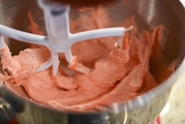 Homemade strawberry cake batter in a mixing bowl.