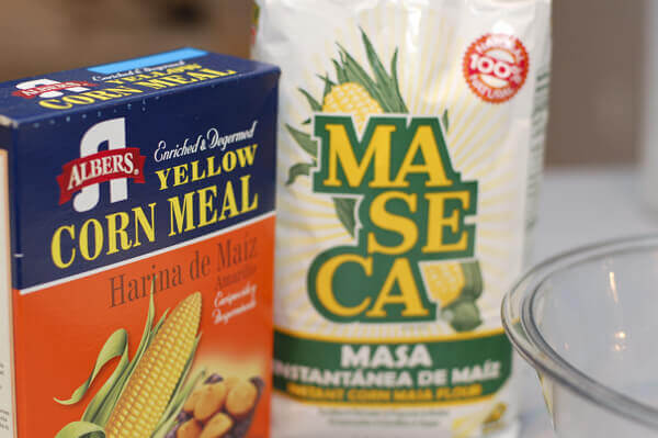 Box of yellow corn meal and bag of Maseca corn flour