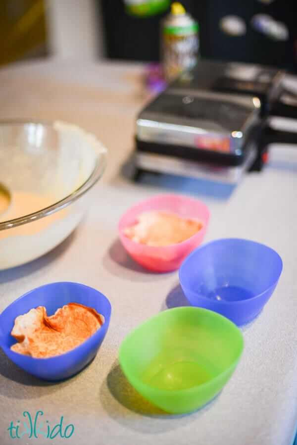 wafer cookies cooling in plastic bowls to create ice cream waffle bowls.  