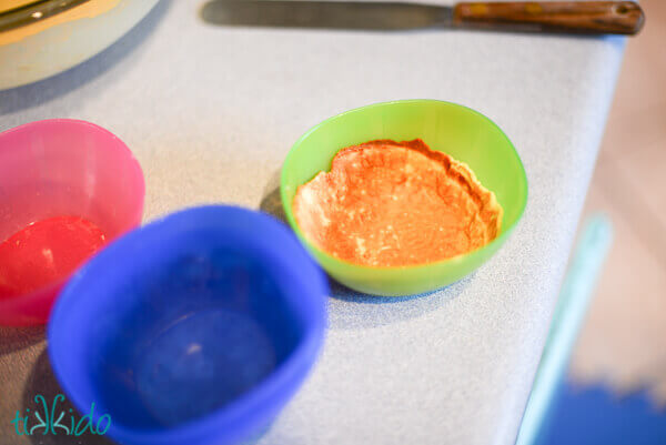 wafer cookies cooling in plastic bowls to create ice cream waffle bowls.  