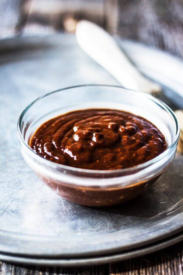 Mole chocolate stout ice cream topping in a glass bowl.