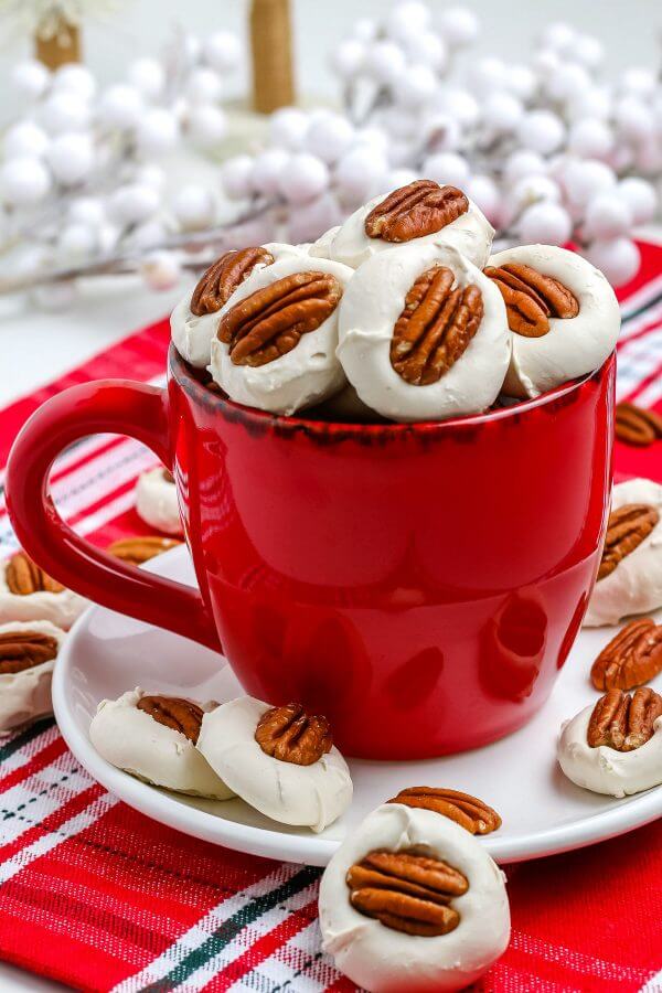 Homemade divinity candy in a red mug.