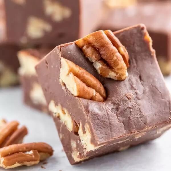 Piece of microwave fudge with pecans.