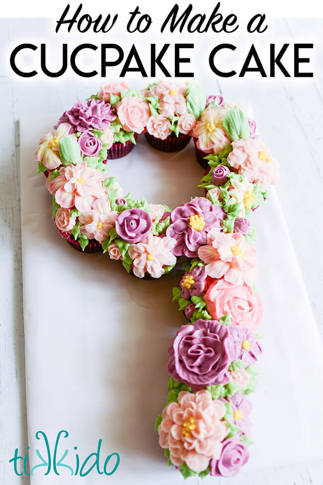 Cupcake cake shaped like the number 9, covered in buttercream icing flowers and leaves, with text overlay reading "How to Make a Cupcake Cake."