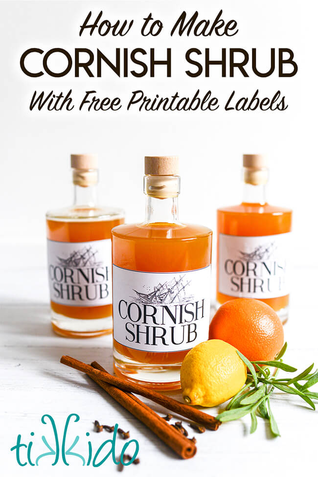 Three bottles of Cornish shrub cordial surrounded by spices, citrus, and rock samphire, with text overlay reading "How to Make Cornish Shrub with Free Printable Labels."