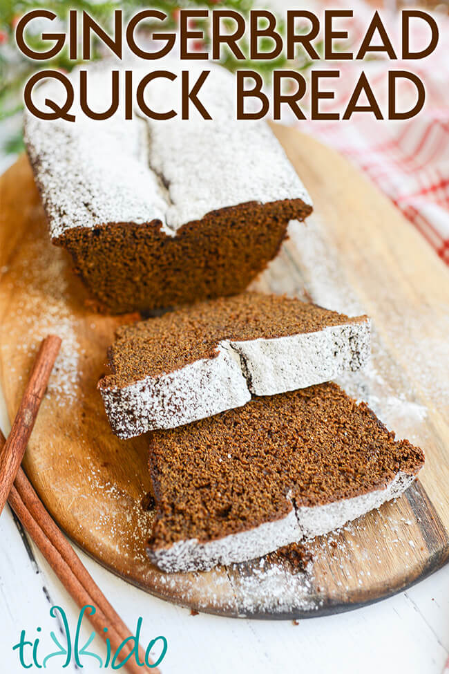 Gingerbread loaf sliced on a wooden cutting board, with text overlay reading "Gingerbread Quick Bread."