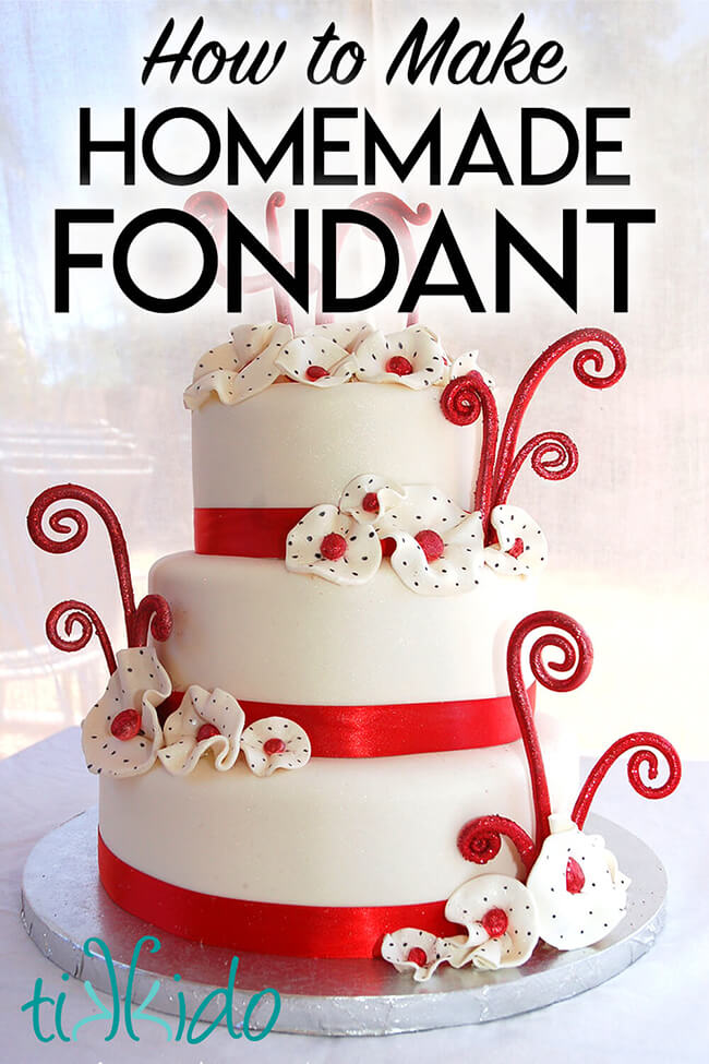 Three tier cake covered in white fondant, with red, white, and black decorations, with text overlay reading "how to make homemade fondant."