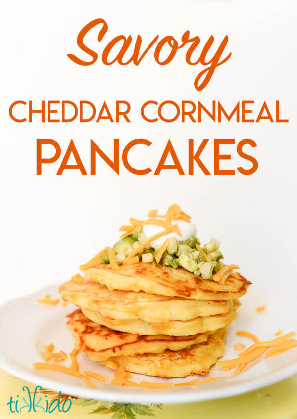 Recipe for savory cornmeal cheddar pancakes topped with guacamole, sour cream, and cheddar cheese