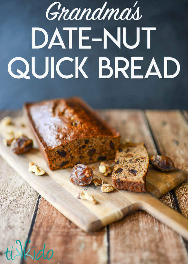 Loaf of date nut bread on a cutting board on a wooden table, surrounded by whole dates and walnuts.  Text overlay reads "Grandma's Date-Nut Quick Bread."