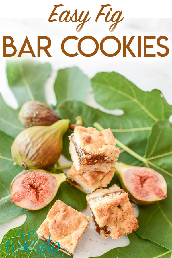 Fig Bar Cookies Fig bar cookies stacked on top of fresh fig leaves and surrounded by fresh figs. Text overlay reads "Easy Fig Bar Cookies."