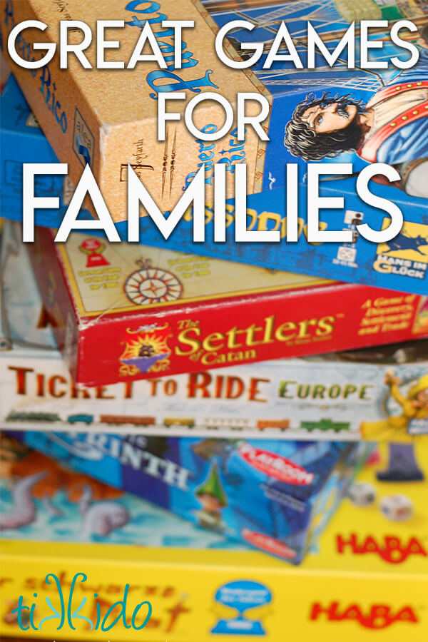 Stack of family board games overlaid with text reading "Great Games for Families."