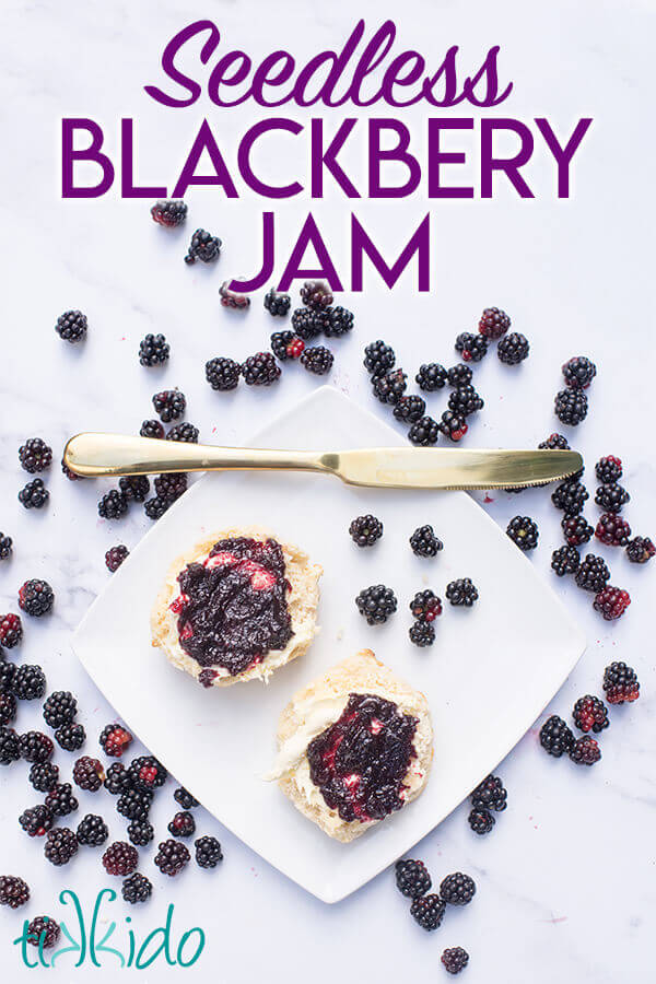 Two scone halves spread with homemade blackberry jam, surrounded by fresh blackberries, with text overlay reading "Seedless Blackberry Jam."