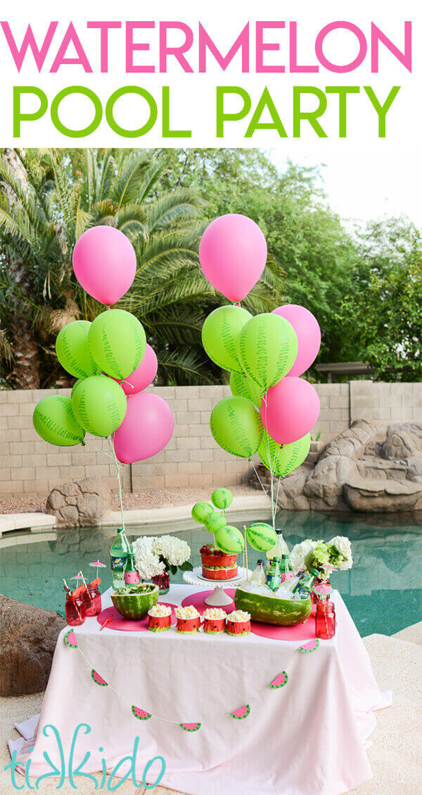 Food table full of watermelon treats sitting next to a pool.  Text overlay reads "watermelon pool party."