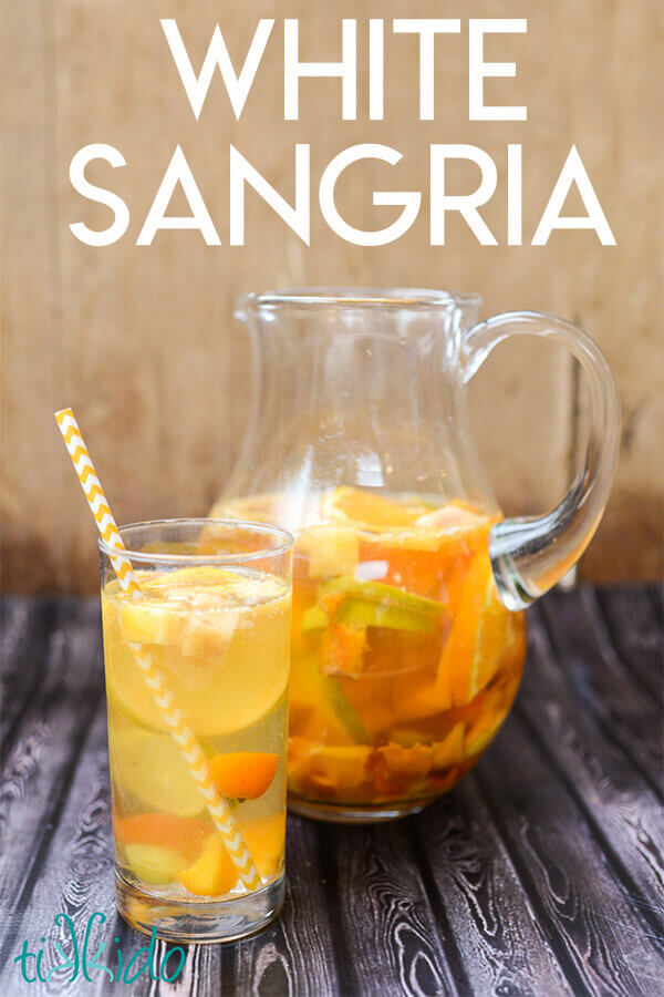 Pitcher and glass of white sangria (Spanish sangria made with white wine)