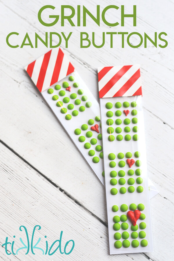 Two packages of Grinch Candy Buttons inspired by How the Grinch Stole Christmas.