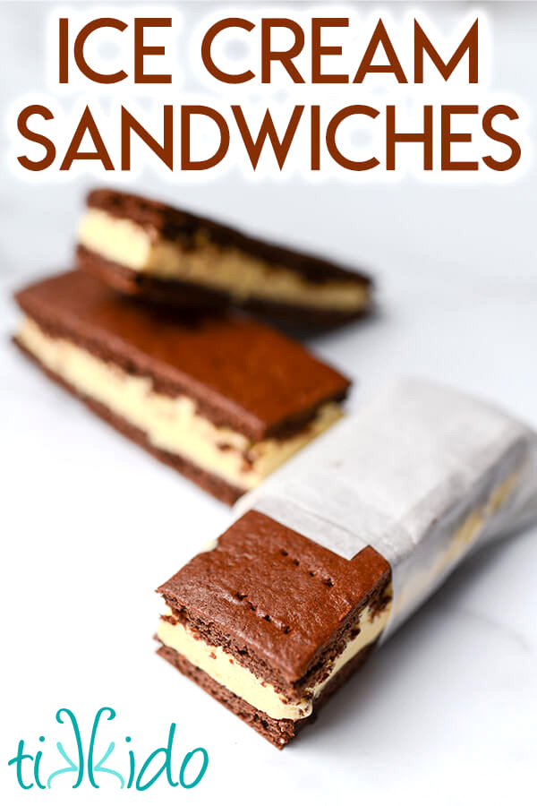 Homemade ice cream sandwiches on a white marble surface.