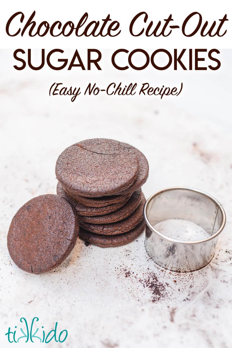 Stack of round chocolate sugar cookies next to a round cookie cutter, with text overlay reading "Chocolate Cut-Out Sugar Cookies (Easy No-Chill Recipe)."